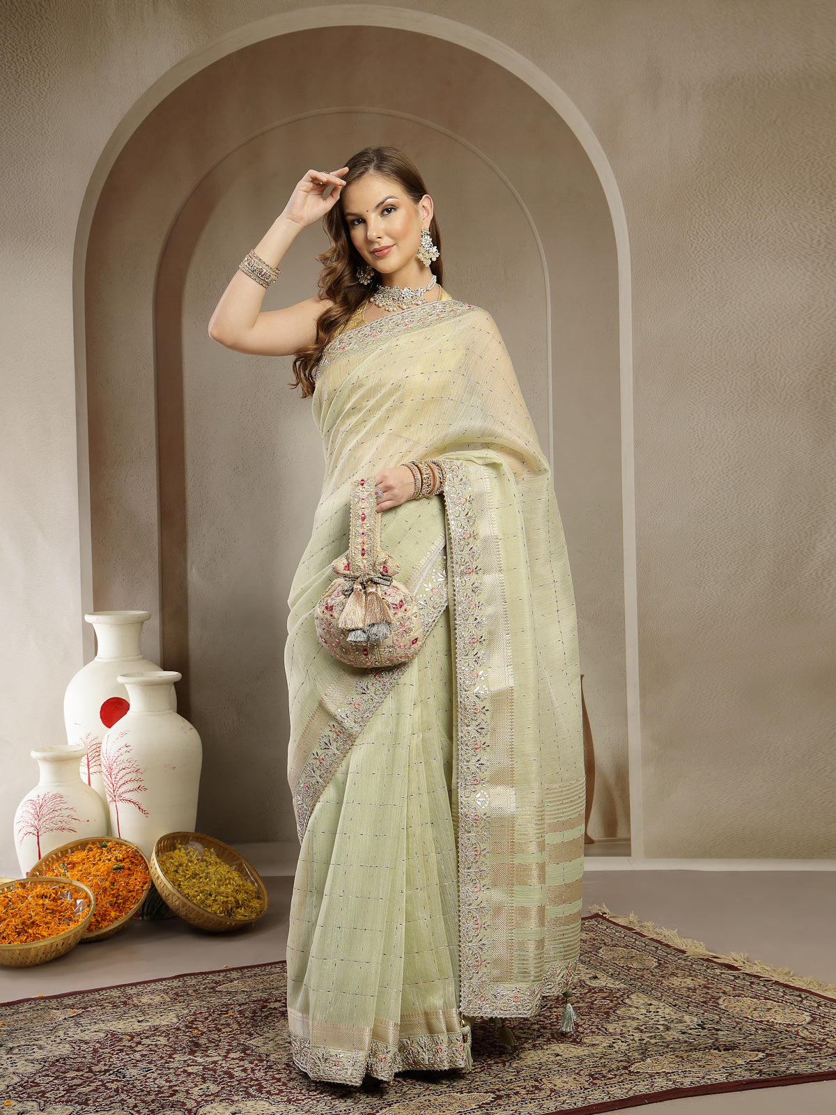 Pastel Pistachio Green Handcrafted Embroidered Organza Saree