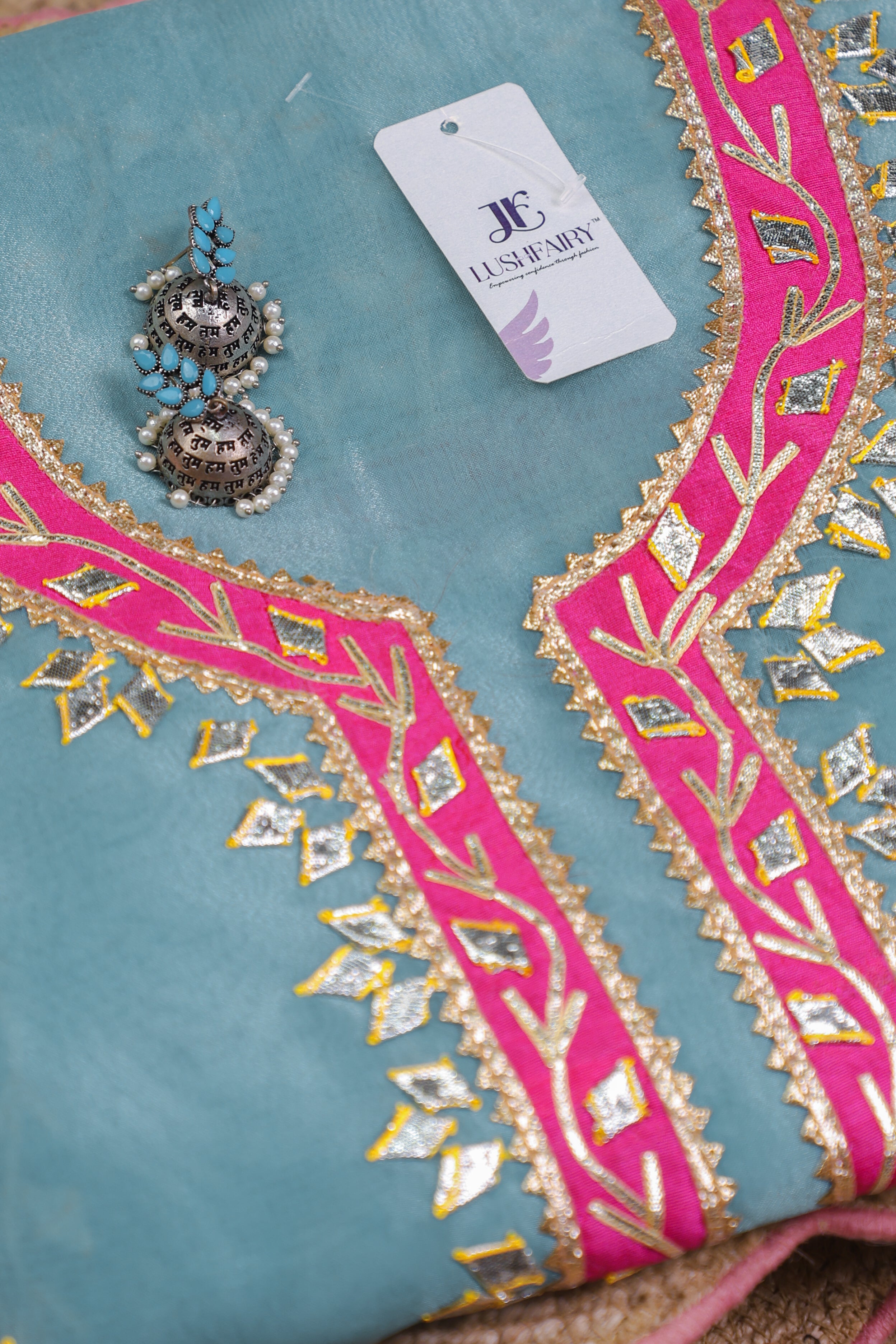 Turquoise Charm Unstitched Suit Set with Vibrant Pink Accents and Heritage Gota Patti Work