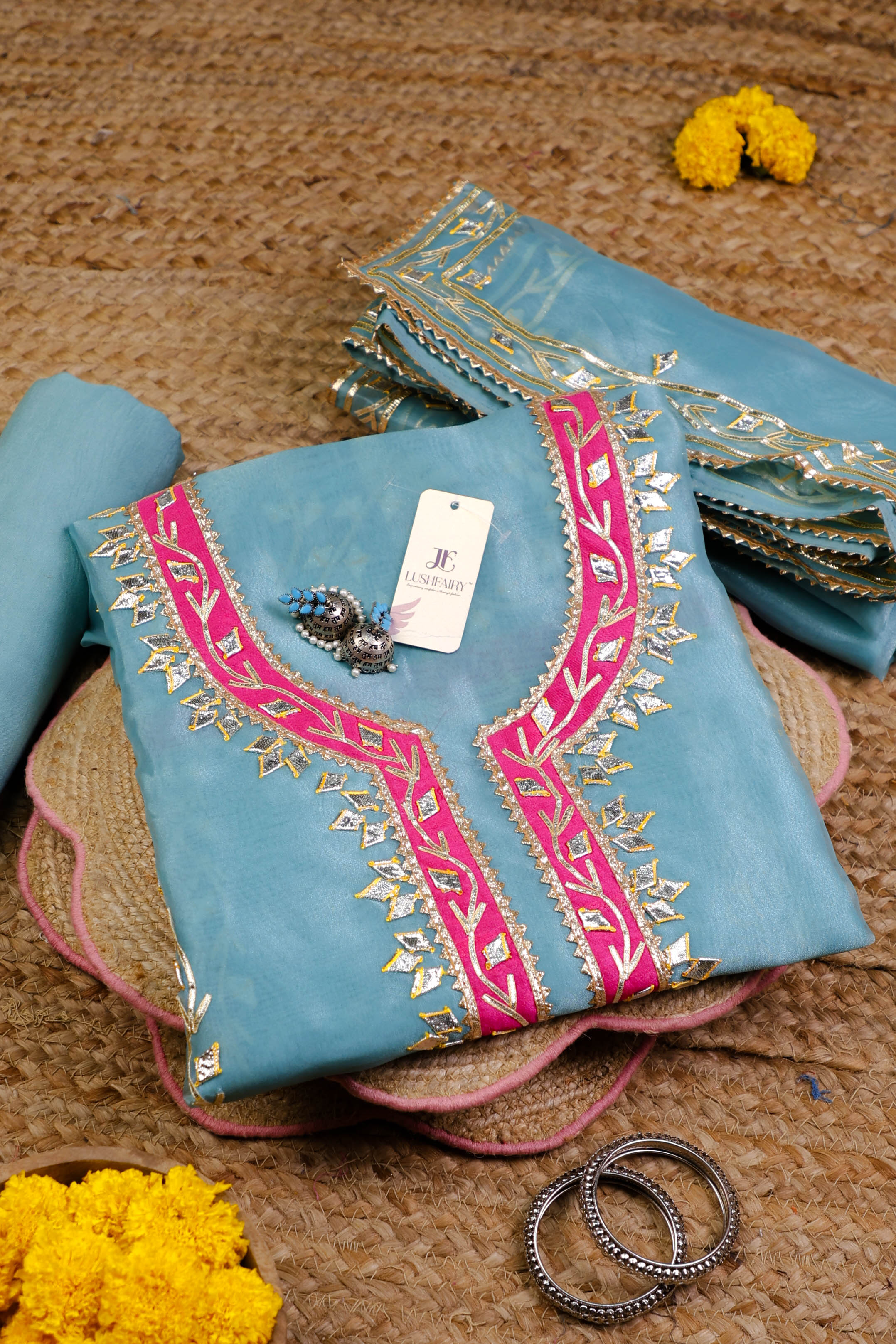 Turquoise Charm Unstitched Suit Set with Vibrant Pink Accents and Heritage Gota Patti Work