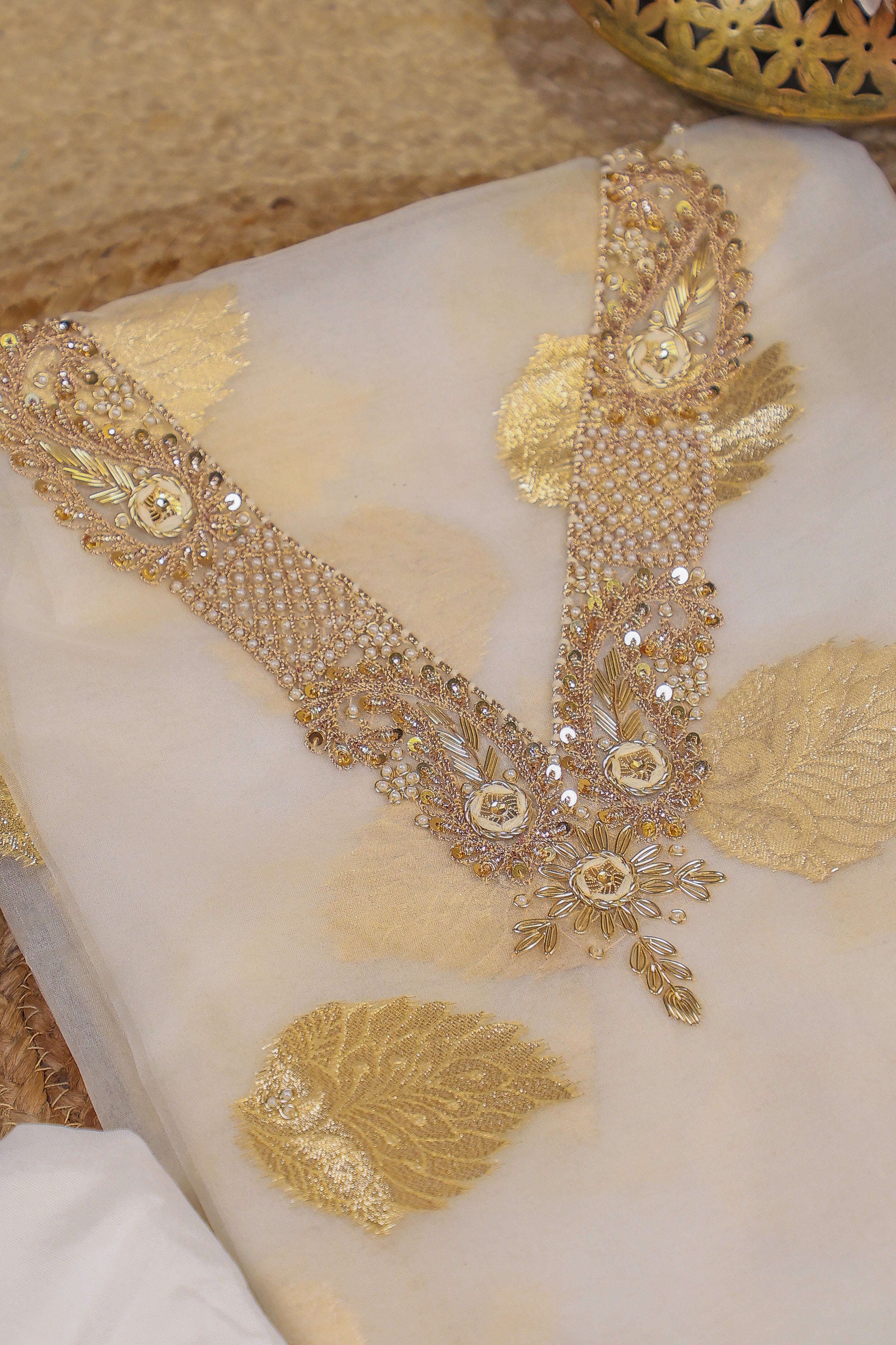 Off White Unstitch Suit with V-Neck Handcrafted Zardozi and Heavy Gota Patti Work