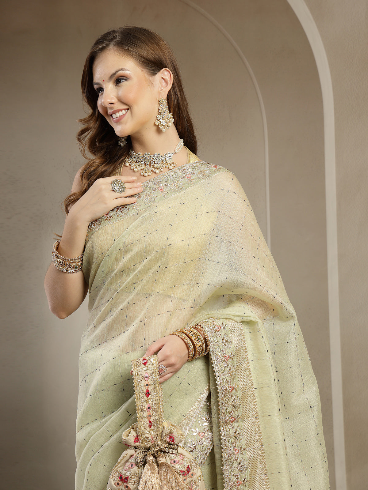 Pastel Pistachio Green Handcrafted Embroidered Organza Saree